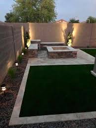 Fire pit on artificial grass. Gallery Of Fire Pits Outdoor Fireplaces The Yard Stylist
