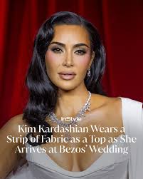 What did Kim Kardashian wear to kick off Jeff Bezos's wedding? A Balenciaga  bandeau top. Click the link below to see her nearly naked look ⬇️.