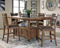 These pieces can be more practical for tall family members, add an interesting height variation to furnishings and also appear take up less space visually. Royard Counter Height Dining Room Table By Ashley Furniture Nis987058322 Missouri Furniture