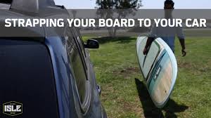 Since a stand up paddle board is a large and cumbersome piece of equipment, safety is among the if you have some variation of loading rack already on your car roof, it's best to pick a sup board system. How To Strap Your Paddle Board To Your Car Youtube