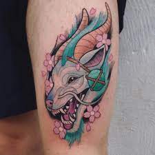 Anime Style Creature Tattoo Anime Style Creature With Horns Inked On The Left Thigh Baby Dragon Tattoos Dragon Tattoo Artist Spirited Away Dragon Tattoo