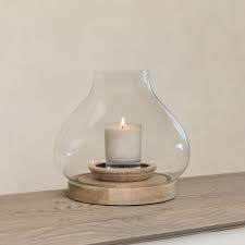 Set up to work with votive candles, this little holder is perfect for personal altars or meditation spaces. Glass Hurricane Lamps For Candles Glass Storm Lantern Motta Living