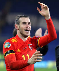 ● gareth bale | wales727. Jubilant Gareth Bale Celebrates Euro 2020 Qualification By Holding Up Fans Hilarious Wales Golf Madrid Flag