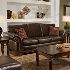 First add color directly to your leather furniture with colorful throws and decorative accent pillows. Living Room Decorating Ideas Dark Brown Leather Sofa Novocom Top
