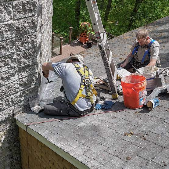 What Comes First When Reworking the Flashing Around a Chimney