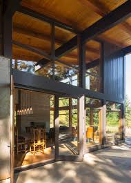 Clean lines, artful ways of using glass welcoming your outside in and structural steel cantilevers are all elements that logangate incorporates into your modern post and beam home design. Steel Beams Support Dramatic Roof Overhangs At Washington State Retreat By Coates Design