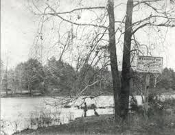 This is a 1864 photo of McFadden Ford guarded by a Union soldier and a dog.  The sign by the tree says McFadden Ford which was made by the repulse of  Confederate