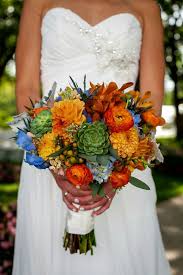 Blue Hydrangea Blue Delphinium Blue Eryngium Thistle Red Orange Ranunculus Orange Mokara Yellow Bridal Bouquets Orange Bridal Bouquet Green Wedding Flowers