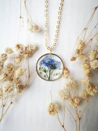 Collier pendentif fleur en acrylique
