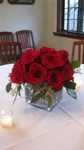 Pin By Tiffanie Moore On Wedding Centerpieces And Table Arrangements Red Roses Centerpieces Red Centerpieces Rose Centerpieces Wedding