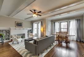 modern and contemporary living room and dining room with vaulted ceilings hardwood floors grey rugs in living room living room decor gray trendy living rooms modern and contemporary living room and