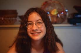 Please can someone refocus my daughter and sharpen this photo 🙂 possibly a  better background, thank you ♥️