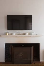 The mantel was purely an item of function, holding tools for stoking the fire and cooking over it. Fireplace Mantels An In Depth Guide With Pictures
