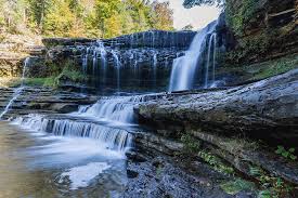 At the time we visited the trail was very overgrown and we got turned around a few times. Cummings Falls Photograph By Larry Waldon