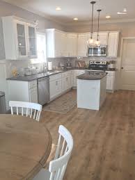 Riverbend Oak In Pergo Xp Laminate Flooring Kitchen Remodel Small Galley Kitchen Remodel Small Kitchen Layouts