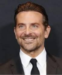 Photo of Bradley Cooper. Despite the fact that his name isn't Italiano, he  is proud to be half paisan! His father was Irish, but Bradley's mother  Gloria (Campano) Cooper is the daughter