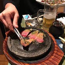 Although it's hard to resist those puppy dog eyes at the dinner table, it may not always be safe to feed your canine companion the same foods you eat. What Kind Of Restaurant Makes You Cook Your Own Food