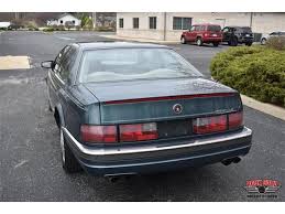 Image result for Dark Polo Green 1991 Seville