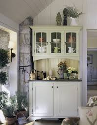 Whether you prefer cottage or traditional style cabinetry and trim, we will design and build to meet your specifications and requests. Burlington Built In Kitchen Hutch Entry Shabby Chic Style With Terracotta Pots Lever Handles Sconce