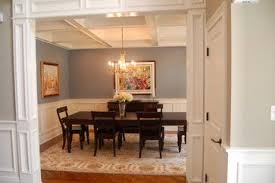 Cream upholstery, sturdy brick, and wood make the living room welcoming, while elegant portraits and mantle decor create the perfect place to entertain guests. Center Hall Colonial Design Ideas Pictures Remodel And Decor Colonial House Interior Center Hall Colonial Colonial House