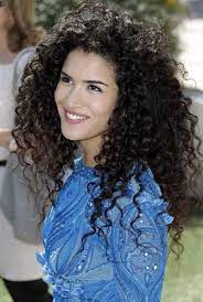 To cut curly hair into layers, first part the back of your hair and divide it into 2 sections. Fyeahnorthafricanwomen Curly Hair Styles Curly Hair Styles Naturally Curly Hair Tips
