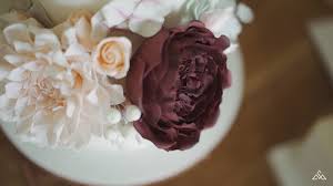 If you can dream up a flavour for your pair a cheese 'cake' with fine crackers and dried fruits and decorate with flowers as you would a traditional. Love Wedding Cakes Norfolk Wedding Cake Maker