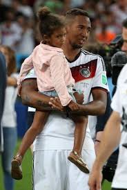 German defender jerome boateng says he has banned his wife and children from travelling to watch him during euro 2016 because 'the risk of a terror attack is too big'. Jerome Boateng Of Germany Holding One His Twin Daughters Celebrates Jerome Boateng Germany Fifa 2014 World Cup