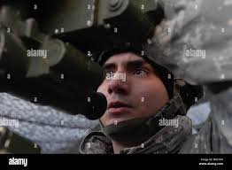 Army Sgt. Michael Jimenez, a native of Chicago, assigned to B Battery, 2nd  Battalion, 377th Parachute Field Artillery Regiment, 4th Infantry Brigade  Combat Team (Airborne), 25th Infantry Division, U.S. Army Alaska, adjusts