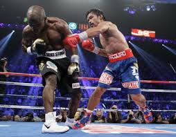 Photo Of Manny Pacquiao Landing A Punch On Timothy Bradley During Last Night S World Boxing Organization Manny Pacquiao Timothy Bradley Boxing Manny Pacquiao