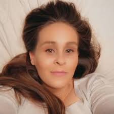 That was my child." The family of a woman who died after she was taken into  custody and fell out of a moving police patrol car is demanding answers in  her death.