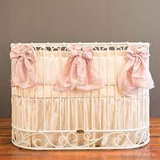 This oval crib can accompany your child from birth all the way to kindergarten. Serafina Jadore Collection Cream Oval Crib Crib Bedding Crib Bedding Sets