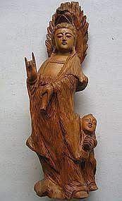 Maybe you would like to learn more about one of these? Wood Carving Of Guan Kwan Yin Statue Item 851198