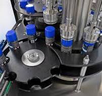 Aerosol Actuator (Button) Placer - R+ R Aerosol Systems Ltd
