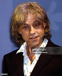 Presenter Martin Wainwright with Regional Media Award winner Lorna... News  Photo