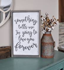 If you are tired of your master bedroom, you can incorporate a few changes that make a big difference. Something Tells Me Wood Sign Gallery Wall Rustic Wood Sign Love Saying Wedding Gift Farmhouse Bedroom Decor Rustic Master Bedroom Rustic Farmhouse Bedroom