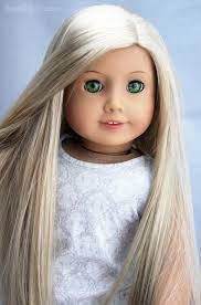 Closeup portrait of a confident young american african girl with long curly hair standing alone against a white. Custom Ooak American Girl Doll Green Eyes And Long Blonde Hair Felicity With Julie Wig American Girl Doll Hairstyles Custom American Girl Dolls Doll Hair