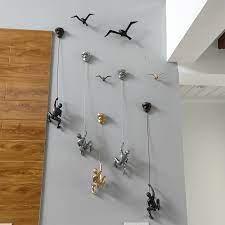 When it comes to home decor and interior design, you need at least one thing that adds a little bit of statement to your home, whether these climbing and flying men are one of our signature pieces of home accessories and wall decoration pieces that really kick start conversations. Creative Rock Climbing Men Sculpture Resin Statue Figurine Ornaments Home Decor Wall Hanging Decorations Statues Sculptures Aliexpress