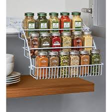 A Pull Down Rack That Keeps Your Favorite Spices And Flavors At Arm S Reach In Even The Most Convoluted Kitchen Space Kitchen Storage Hacks Spice Storage Spice Storage Solutions