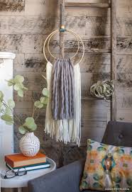 Macrame is the perfect way to add texture and an organic touch to your boho decor. Simple Diy Yarn Wall Hanging