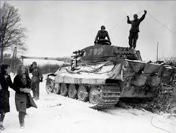 It had advanced optics, powerful gun and despite popular beliefs was quite fast for its weight (690 it's not an effective tank in ww2, it does have an impenetrable upper frontal plate armor and had a stronger 88mm kwk 43 gun. Two American Soldiers Inspect A Destroyed German King Tiger Tank 1944 Rare Historical Photos