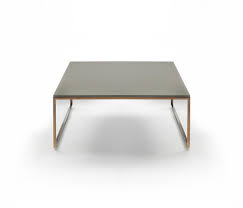 It flaunts a clear, tempered glass top and forged iron frame with subtle rings and curves finished in rustic bronze patina. Frame Coffee Tables From Marelli Architonic