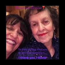 Poodle playing with mom after grooming