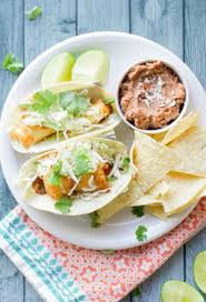 Topped with fresh guacamole, cheese, cilantro, onion, white sauce, mild salsa and cabbage. Copycat Rubios Beer Battered Baja Fish Tacos Allfreecopycatrecipes Com