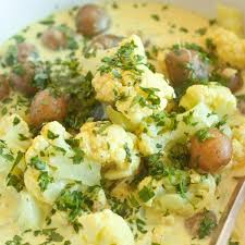 Vegan Cauliflower And Potatoes In Coconut Milk This Is A Delicious Vegan Main That I Serve Over Rice If Y Vegan Cauliflower Vegetable Nutrition Cauliflower