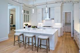 An engineered material like corian or caesarstone also looks beautiful facing forward, especially in a more modern setting. Why You Should Embrace A Solid Slab Backsplash Bergdahl Real Property