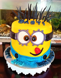 Minions make a fabulous theme for children's birthday parties for boys another wonderful design from hot mama's cakes features three minions on top on a single tier. Minion Cake Design Cedriel S Homemade Breads And Pastries Facebook
