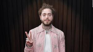 Post malone has deputed a new look, which features him with his head bald and massive tattoos on his head. Post Malone Got A New Face Tattoo For The New Year Cnn