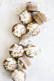 These Coconut Carrot Cake Muffins Are Filled With Shredded Carrots And Toasted Coconut And Drizzled With A Carrot Cake Muffins Toasted Coconut Sweet Breakfast