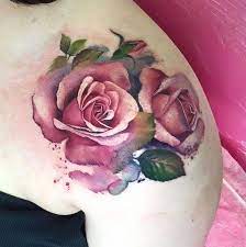 Pink rose tattoos symbolize a gentle caring love, and can even be placed with the breast cancer symbol to honor a loved one. The Meaning Of Rose Tattoos 8 Steps