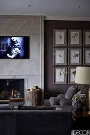 Pair your dark, textured gray sofa with any combinations of black and white frames to create a modern aesthetic. 35 Best Gray Living Room Ideas How To Use Gray Paint And Decor In Living Rooms